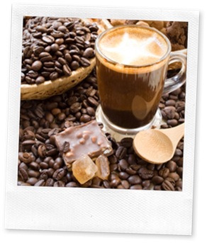 coffee beans and a cup of tasting coffee